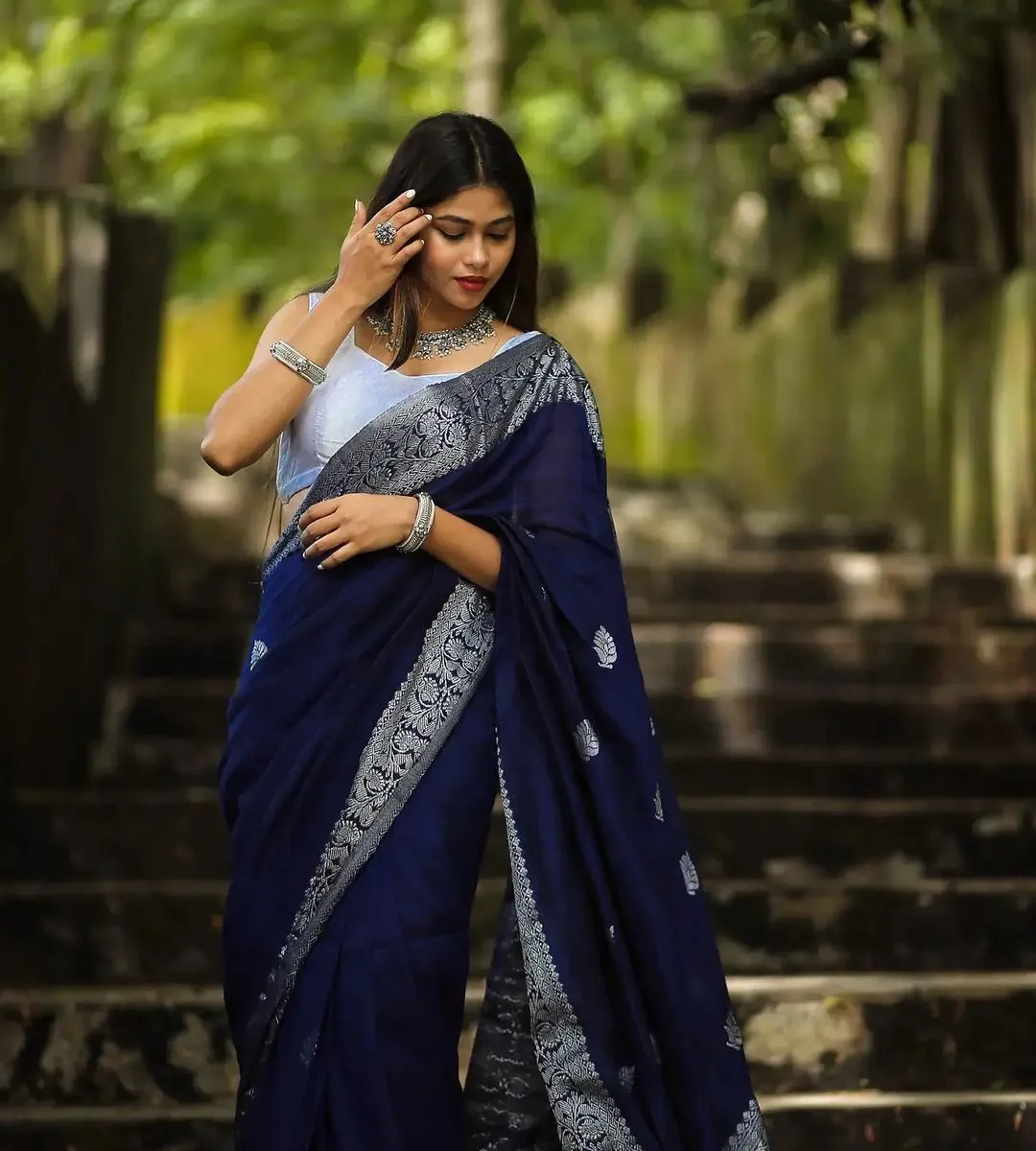 Engrossing Navy Blue Soft Silk Saree With Glowing Blouse Piece