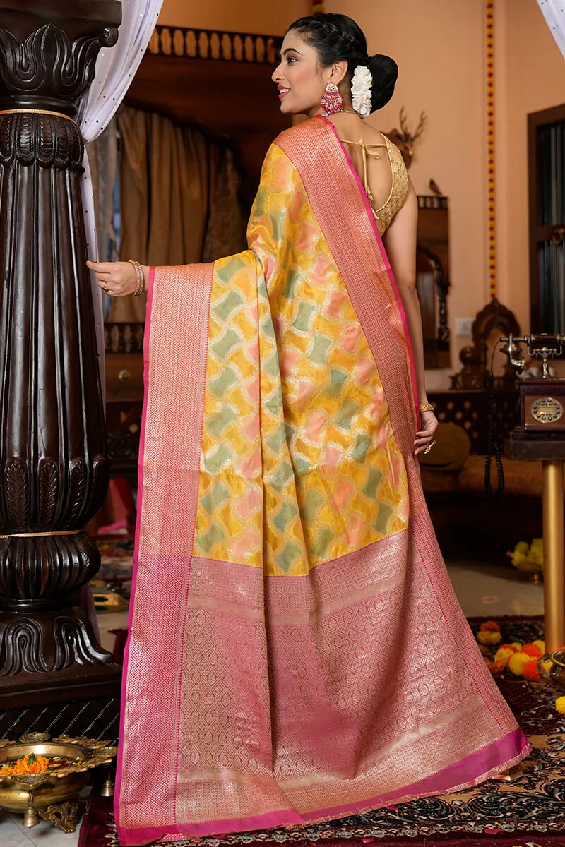 Entrancing Yellow Organza Silk Saree With Glittering Blouse Piece