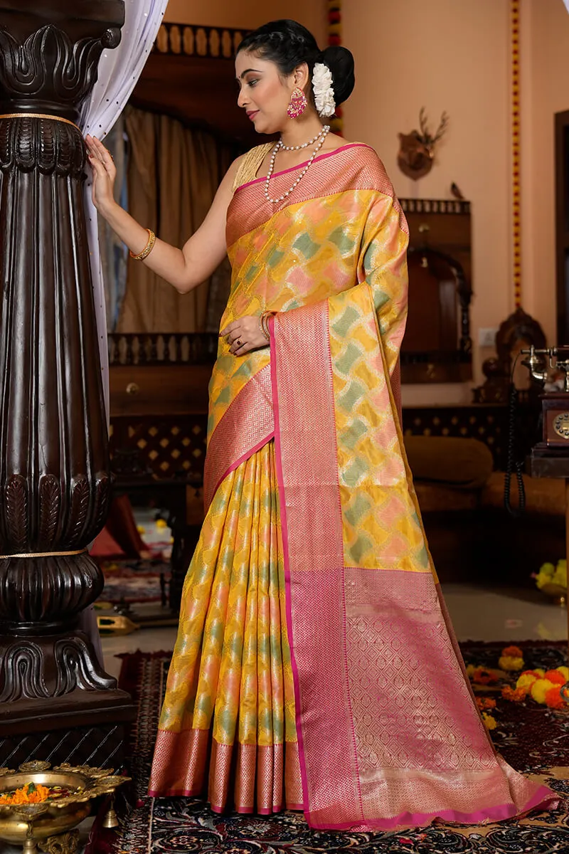 Entrancing Yellow Organza Silk Saree With Glittering Blouse Piece