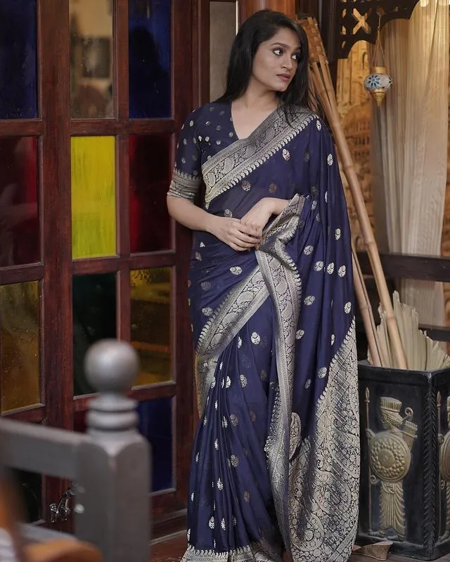 Fragrant Navy Blue Soft Silk Saree With Glittering Blouse Piece