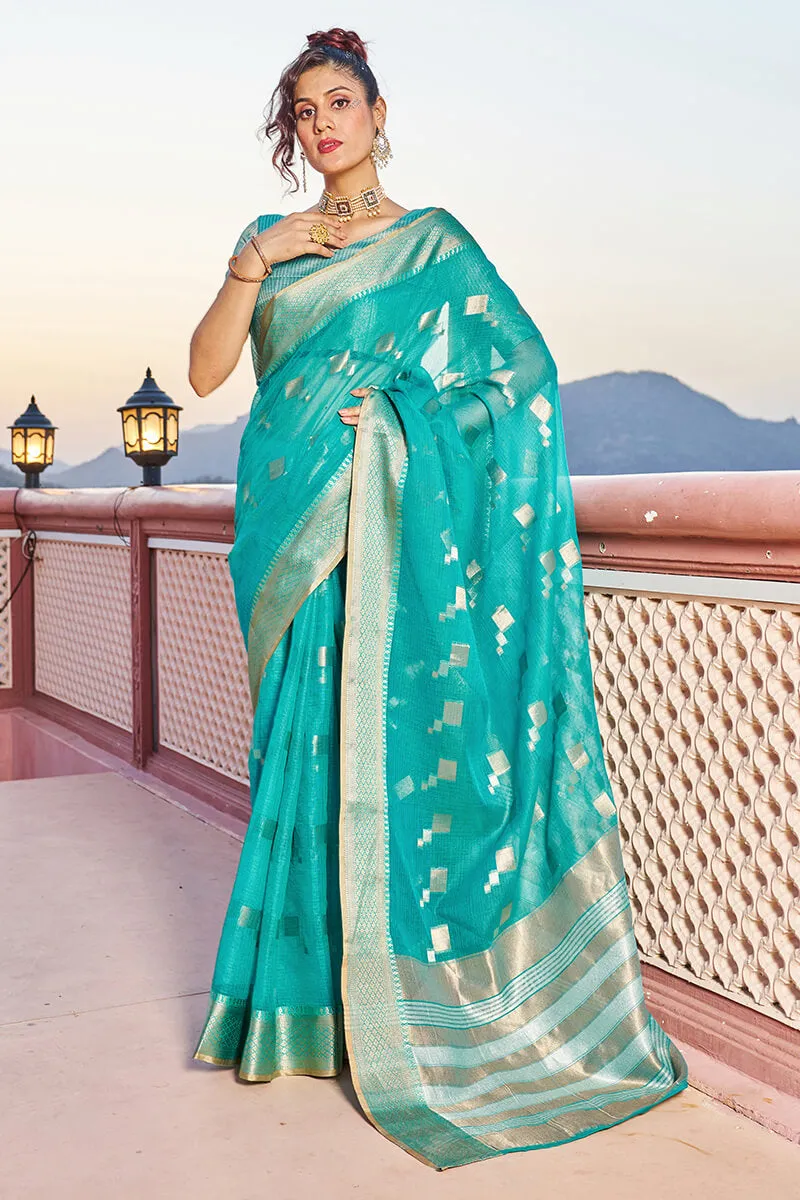 Glittering Turquoise Soft Silk Saree with Conflate Blouse Piece