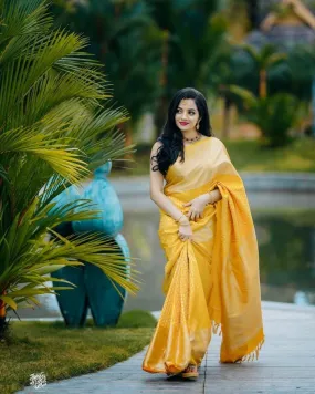 Glittering Yellow Soft Banarasi Silk Saree With Sensational Blouse Piece