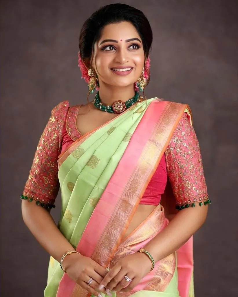 Glowing Pista Soft Silk Saree With Evocative Blouse Piece