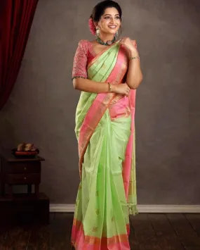 Glowing Pista Soft Silk Saree With Evocative Blouse Piece