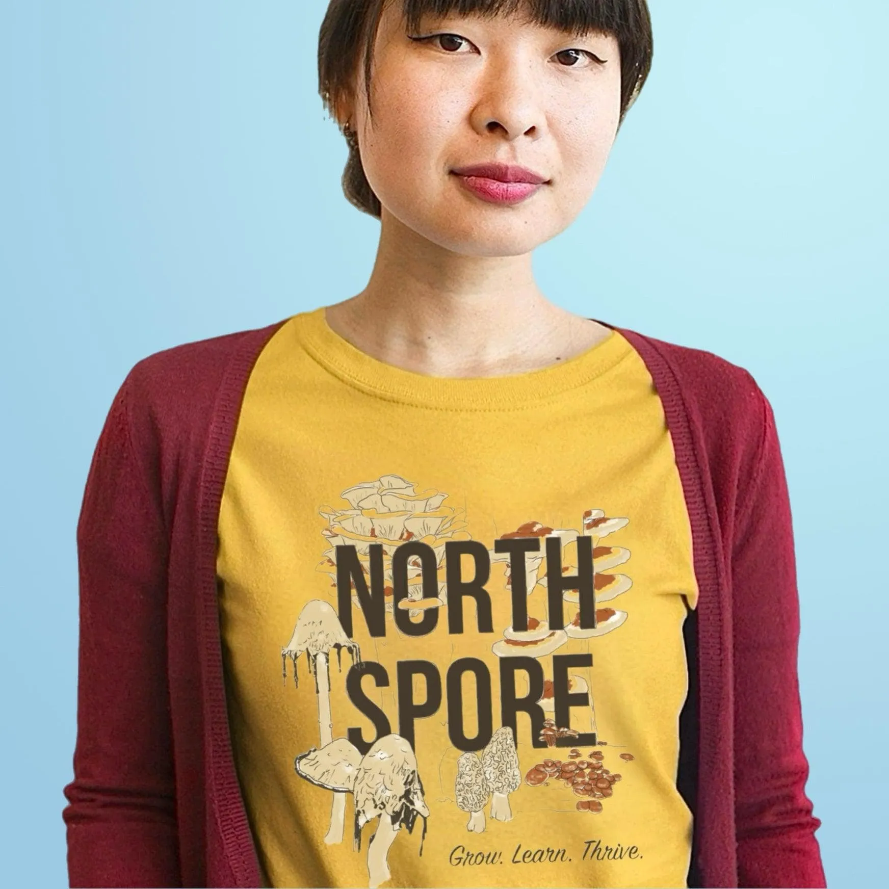 Orange ‘Grow, Learn, Thrive’ North Spore T-Shirt