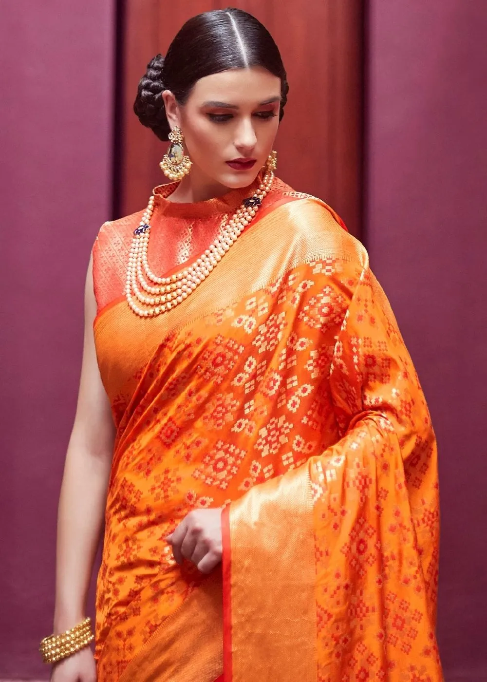 Papaya Orange Woven Patola Silk Saree