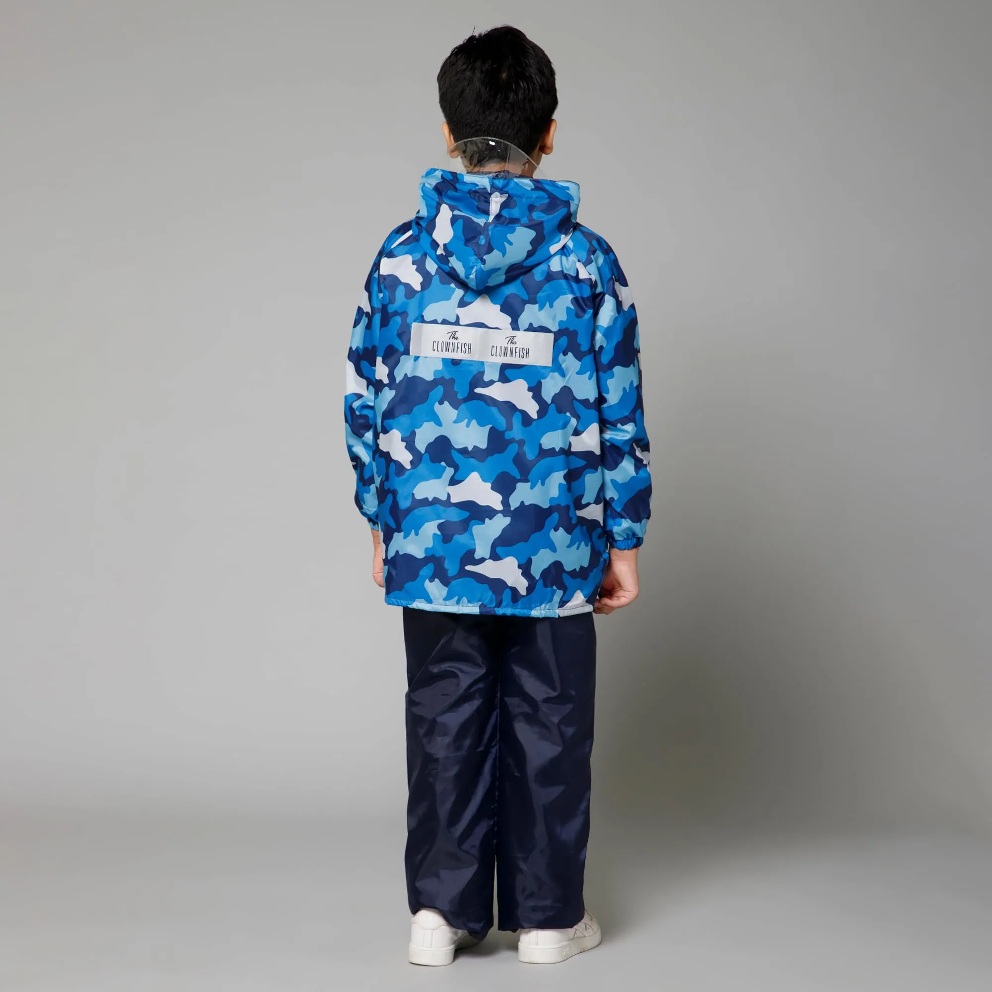 THE CLOWNFISH Comrad Series Kids Waterproof Nylon Double Coating Reversible Raincoat with Hood and Reflector Logo at Back. Set of Top and Bottom. Printed Plastic Pouch. Kid Age-14-16 years(Blue Camo)