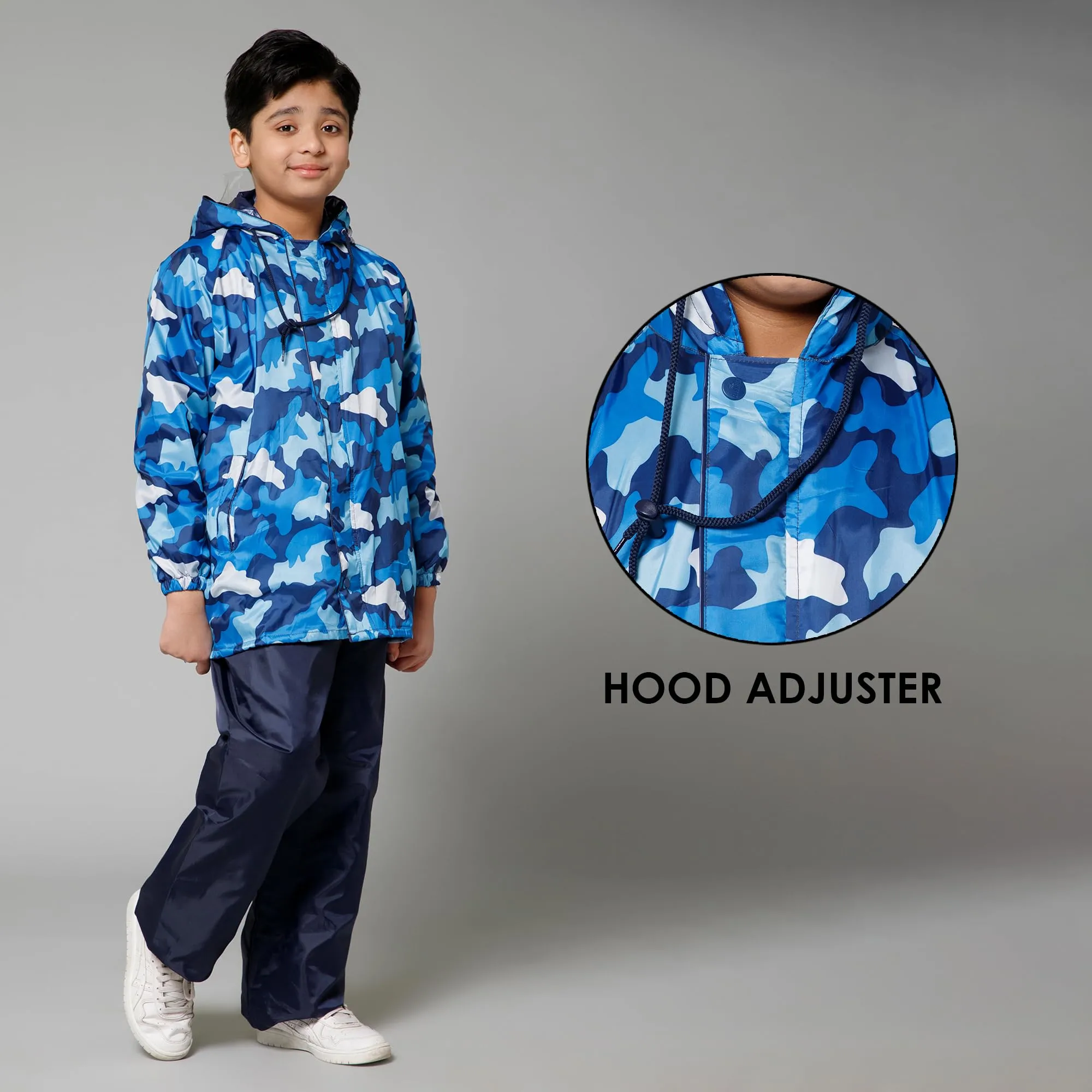 THE CLOWNFISH Comrad Series Kids Waterproof Nylon Double Coating Reversible Raincoat with Hood and Reflector Logo at Back. Set of Top and Bottom. Printed Plastic Pouch. Kid Age-14-16 years(Blue Camo)