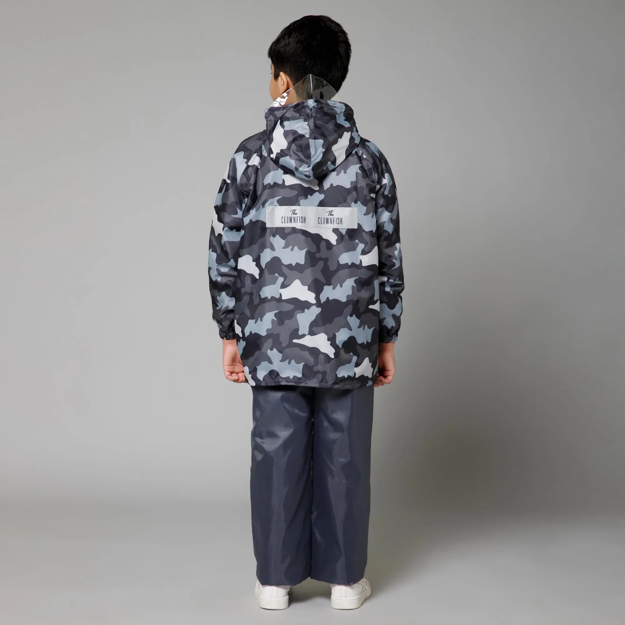 THE CLOWNFISH Comrad Series Kids Waterproof Nylon Double Coating Reversible Raincoat with Hood and Reflector Logo at Back. Set of Top and Bottom. Printed Plastic Pouch. Kid Age-5-7 years(Grey Camo)