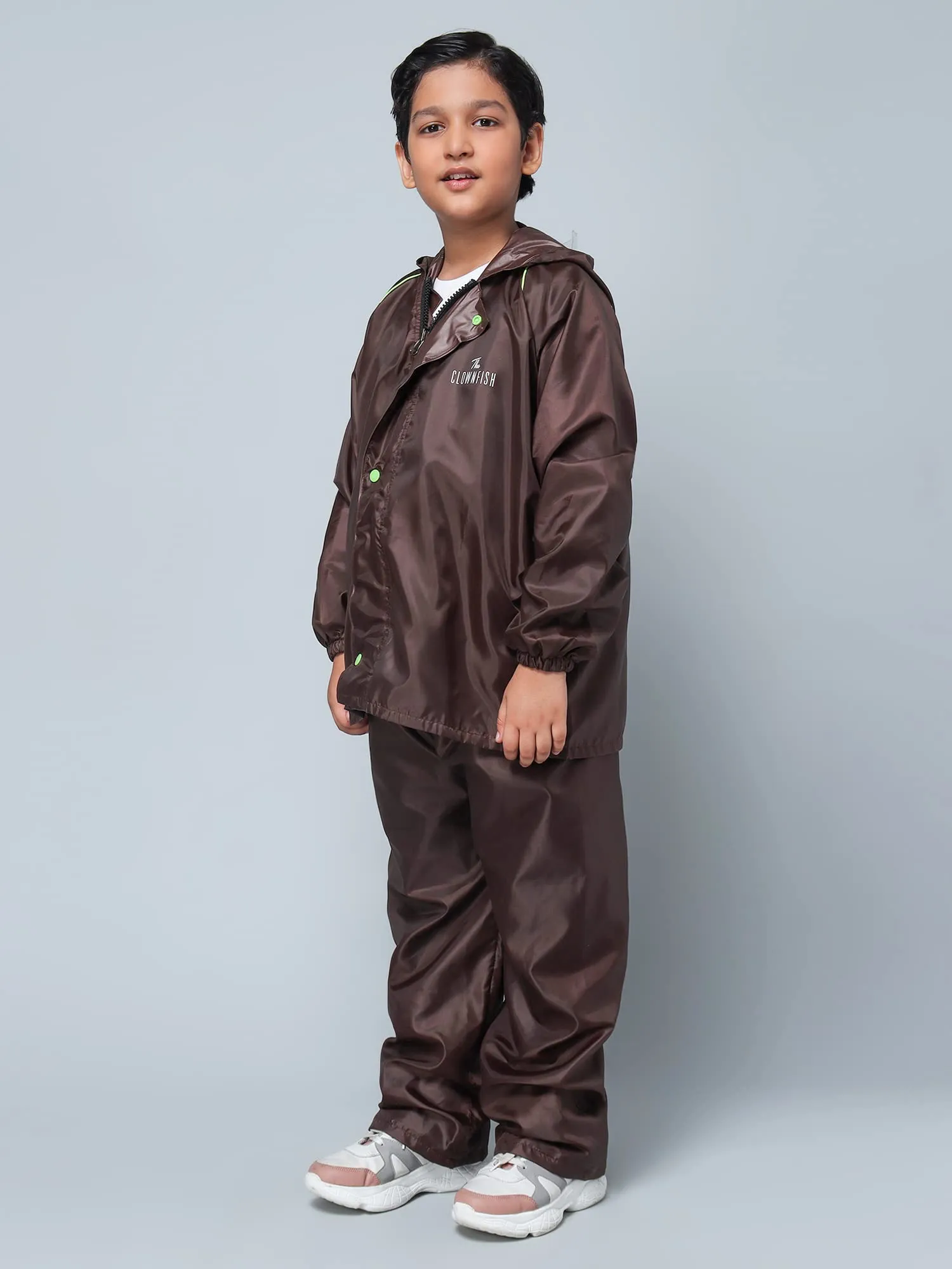 THE CLOWNFISH Duke Series Kid's Waterproof Polyester Double Coating Reversible Raincoat with Hood and Reflector Logo at Back. Set of Top and Bottom. Printed Plastic Pouch Age-8-10 years (Brown)