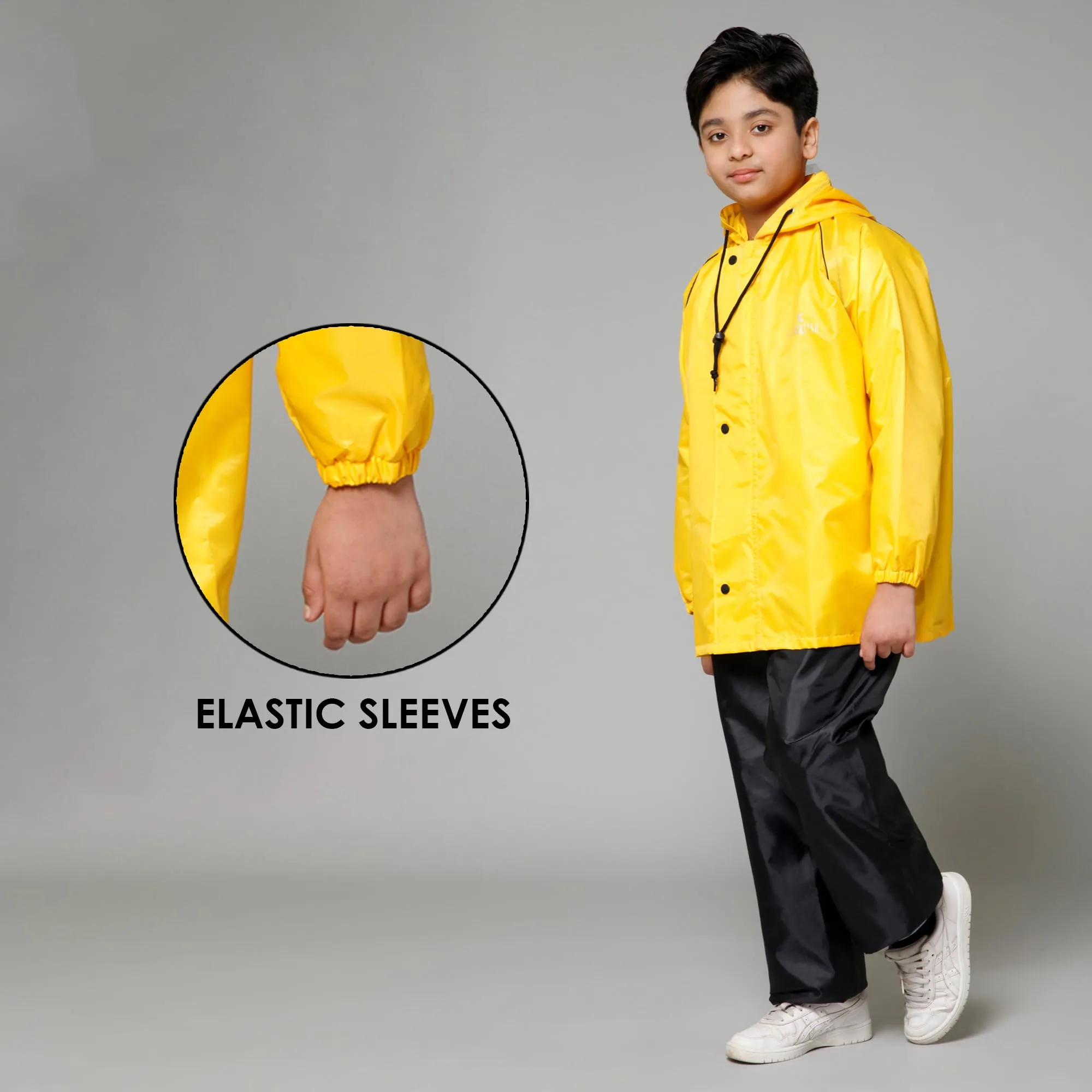 THE CLOWNFISH Duke Series Kids Waterproof Polyester Double Coating Reversible Raincoat with Hood and Reflector Logo at Back. Set of Top and Bottom. Printed Plastic Pouch. Kid Age-14-16 years (Yellow)