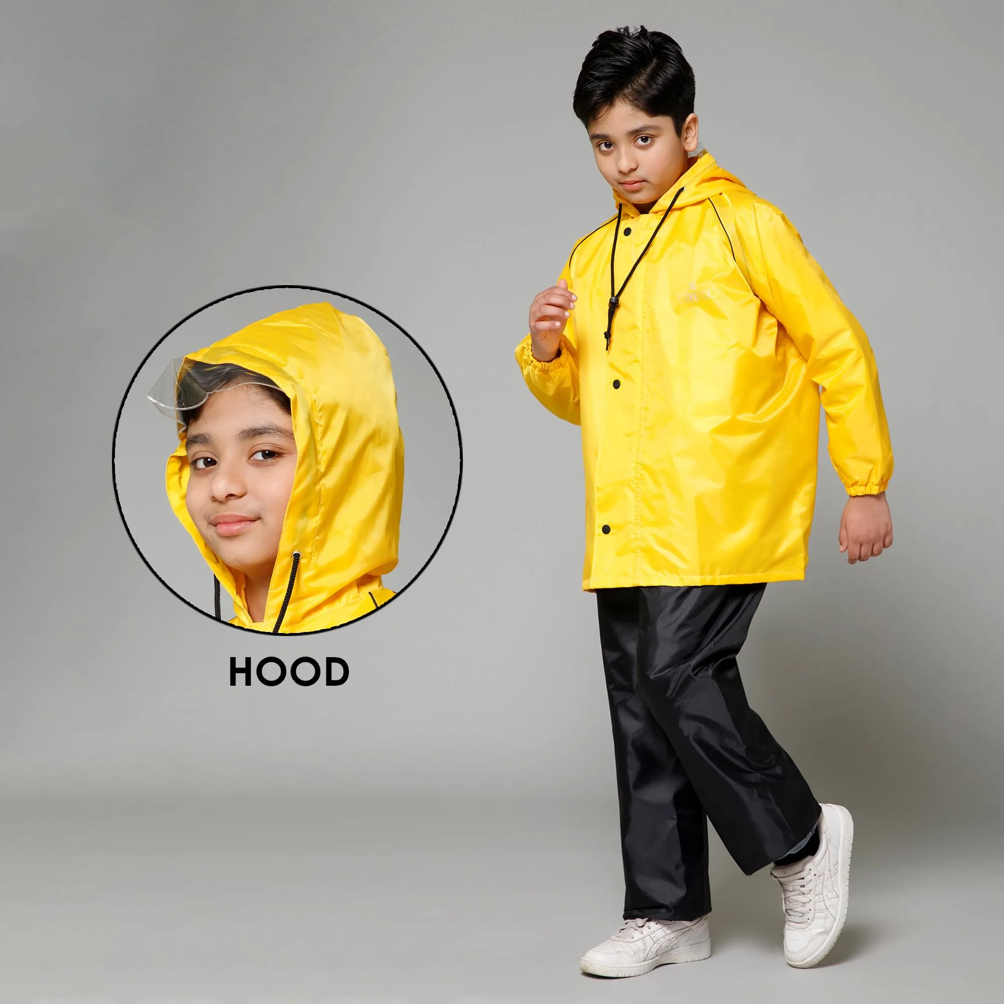 THE CLOWNFISH Duke Series Kids Waterproof Polyester Double Coating Reversible Raincoat with Hood and Reflector Logo at Back. Set of Top and Bottom. Printed Plastic Pouch. Kid Age-14-16 years (Yellow)