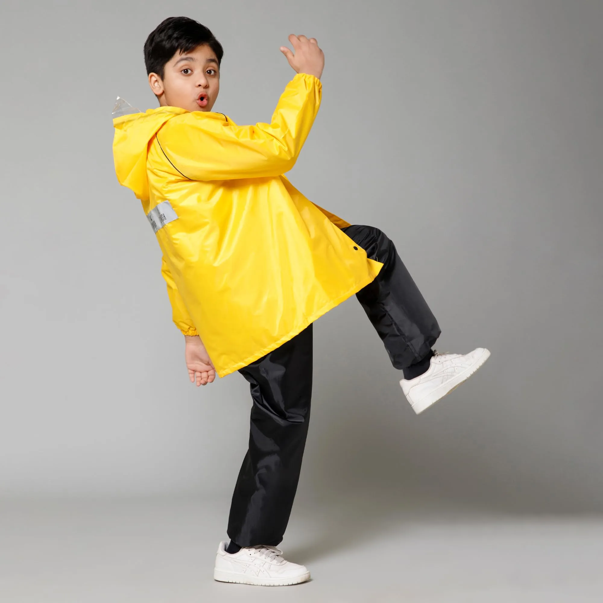 THE CLOWNFISH Duke Series Kids Waterproof Polyester Double Coating Reversible Raincoat with Hood and Reflector Logo at Back. Set of Top and Bottom. Printed Plastic Pouch. Kid Age-14-16 years (Yellow)